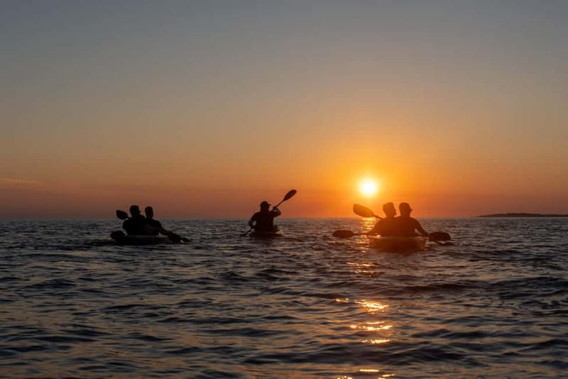 Pula:Sunset Tour By Clear Kayak,Cave,Swim & Cliff Jumping - Clear Kayaks at Golden Hour: The Pula sunset angle