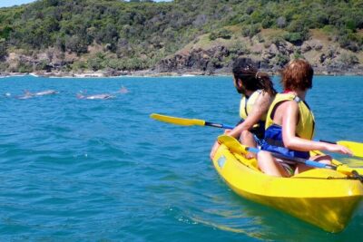 Rainbow Beach: Dolphin & Wildlife Ocean Kayak & Beach 4WD Tour - Kayak setup: wetshirt, life jacket, and first-time confidence