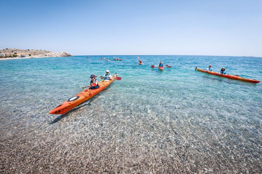 Rhodes: Sea Kayak Adventure to the Red Sand Beach - Kayaking the Rhodes coast: rock formations, castles, and pirate legends
