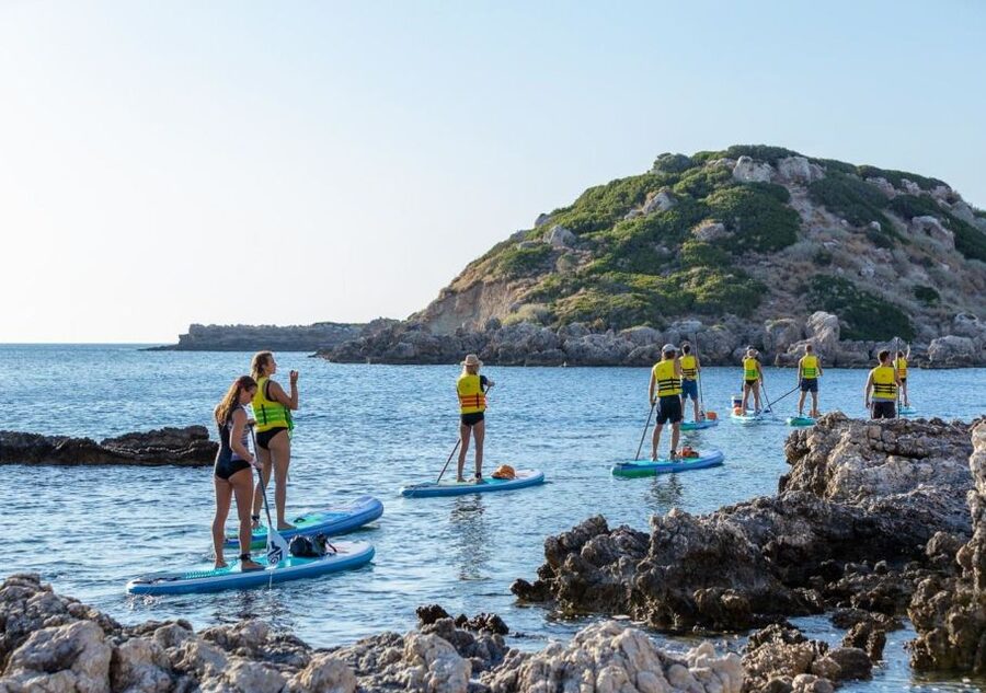Rhodes: Stand-Up Paddleboard and Snorkeling Tour - Hotel pickup, timing, and what the group feels like