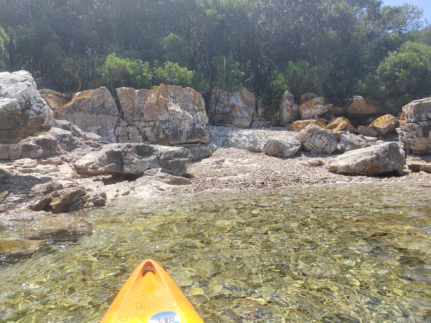 Rovinj: Golden Cape Desert Islands Kayak & Snorkeling Tour - Golden Cape meets Cuvi Beach: how the day starts