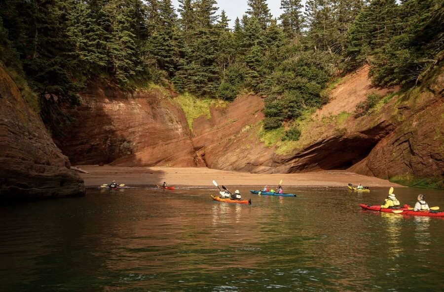 Saint John: Guided Kayaking Tour of St. Martins Sea Caves - The Sea Caves Part: Red Rock Cliffs, Smooth Stone, and Treasure Sand