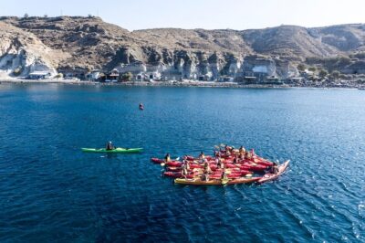 Santorini Guided Sea Kayaking with Light Lunch and Pick-up Option - Sea cave, swimming, and snorkel gear that actually counts