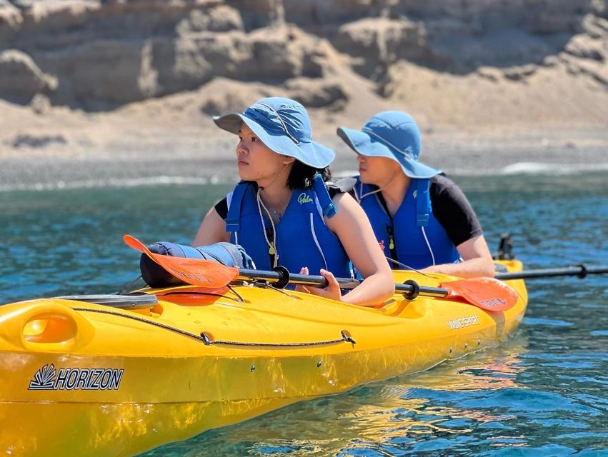 Santorini: Sea Caves Kayak Trip with Snorkeling and Picnic - White Beach Cliff Jumping: The Adrenaline Moment