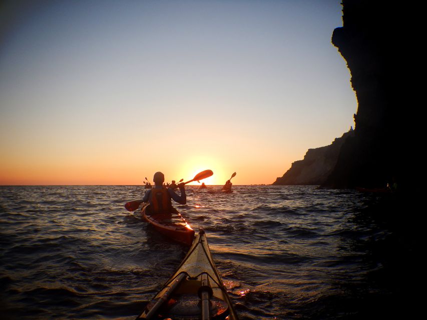 Santorini: Sunset Sea Kayak with Light Dinner - Dry clothes, then dinner in a local taverna