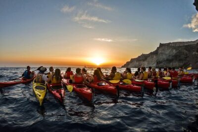 Santorini: Sunset Sea Kayak with Light Dinner with Pick-up Option - From hotel pickup to meeting in Fira (and why it matters)