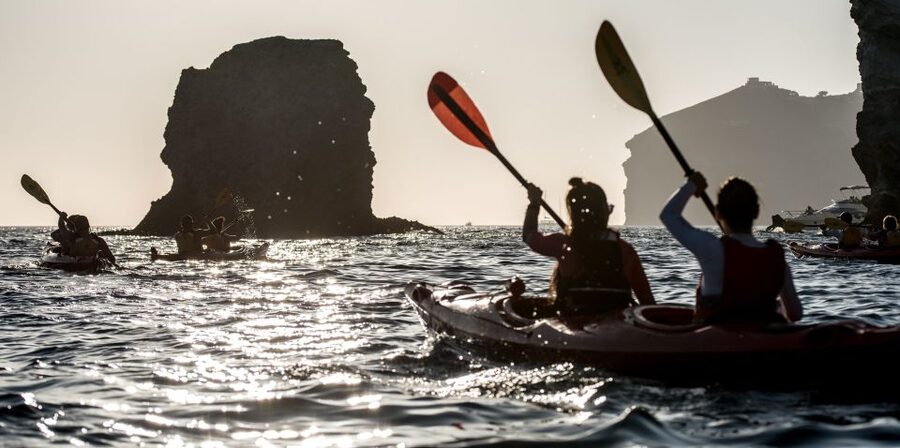Santorini: Sunset Sea Kayak with Light Dinner - The paddle east: White Beach cliffs, then Red Beach volcanic color