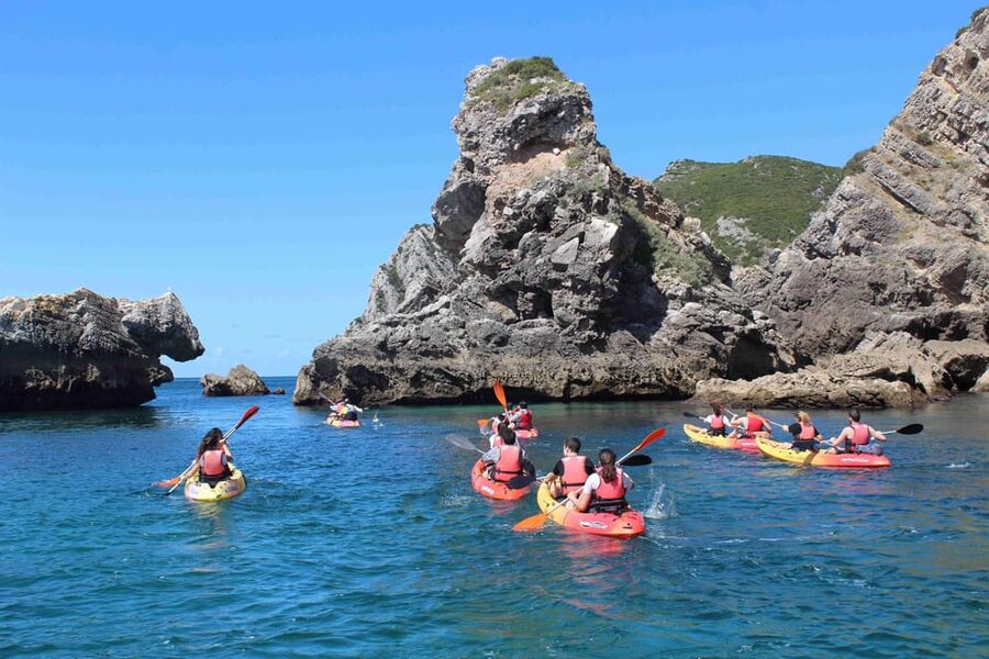 Sesimbra: Ribeiro Cavalo Beach, Caves, & Arrábida Kayak Tour - Starting at Sesimbra Harbor: the first 15 minutes set the tone