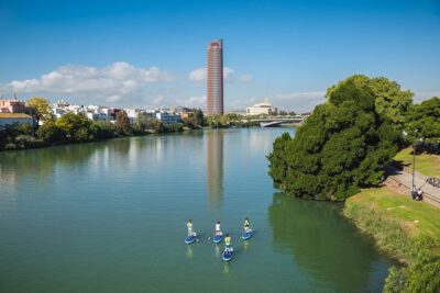 Seville: Paddle Surf Route and Class - Triana’s Colorful Buildings Seen from Water Level