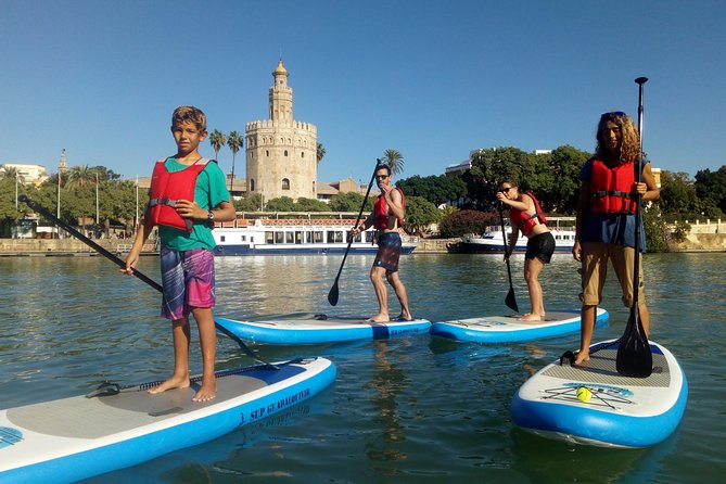 Seville Paddle Surf Sup in the Guadalquivir River - Under Puente de Isabel II (Puente de Triana): The Moment Everyone Remembers