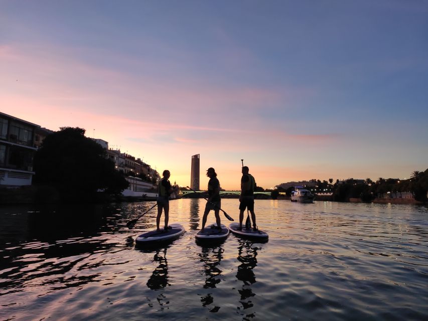 Seville: Sunset and Evening Paddle Boarding Tour - Why Seville’s Guadalquivir looks different after dark