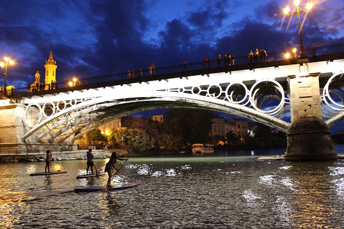 Seville: Sunset in Paddle Surf - Puente de Isabel II and Puente de San Telmo: Bridges Are Part of the Show