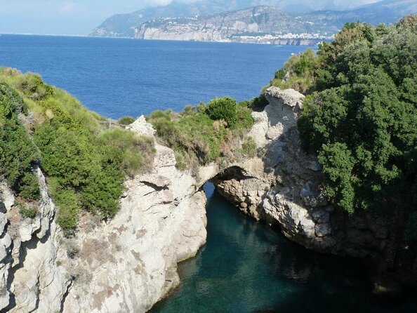 Small group paddle boarding tour to Bagni Regina Giovanna - Bagni Regina Giovanna: the heart-shaped pool and the 1st-century villa ruins