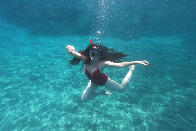Small-Group Santorini Sea Caves Kayak Trip with Snorkeling & Picnic - Stop-by-Stop: White Beach, Mesa Pigadia, the Lighthouse, and Red Beach
