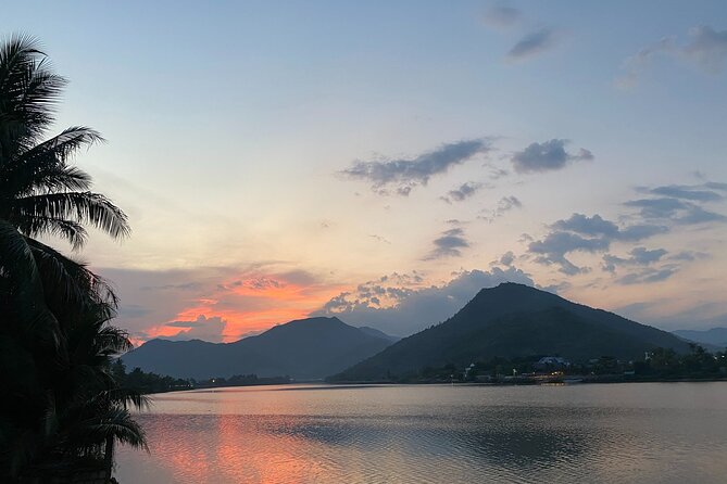 Stand Up Paddle Boarding and Sunset Watching on Cai River - Guide energy and small local moments (like tamarind fruit)