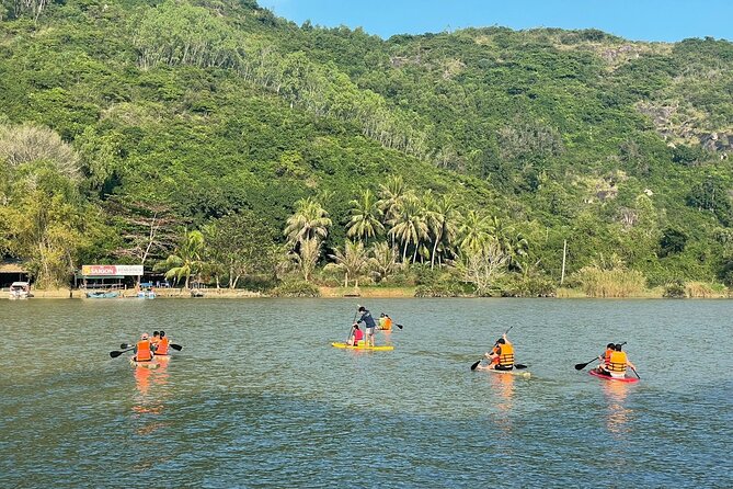 Stand Up Paddle Boarding and Sunset Watching on Cai River - Cruising the Song Cai River: calm water and farmland views