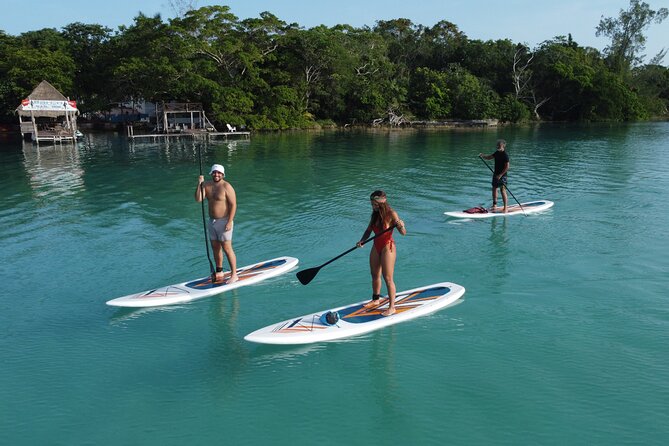 Sunrise on Paddleboard with breakfast in the lagoon of 7 colors - The Black Cenote: A Different Texture in the Same Morning