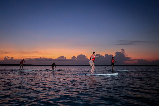 Sunrise Paddle Quest: Embrace the Dawn on Bacalar's Waters - Black Cenote sunrise break: photos, fruit, and a slower pace