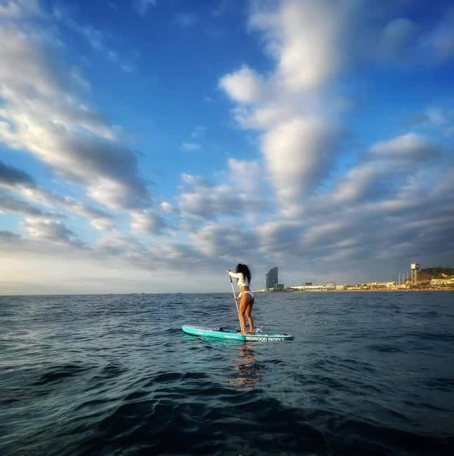 Sunset+paddle surf with music+fotos&videos Barceloneta+snack - Music, snacks, and included photos/videos: the package deal logic