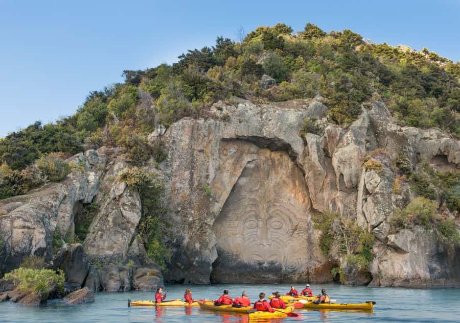Taupo: Maori Rock Carvings Kayaking Tour - Rock jumps and swimming: fun break, cold-water prep