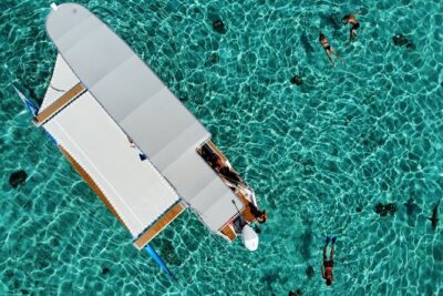 The Vanilla tour of Taha'a in a comfortable outrigger canoe - Blue Lagoon Comfort: Trampoline Lounging and Real Shade