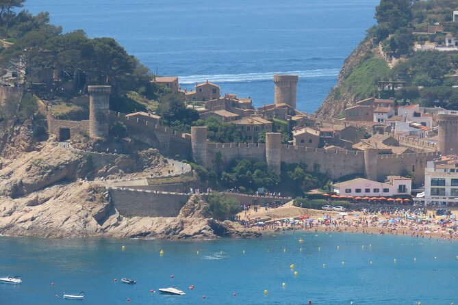 Tossa de Mar: Kayak & Snorkel Tour with Paella from Barcelona - Snorkeling time: clear water, real sea life, and a sensible reality check