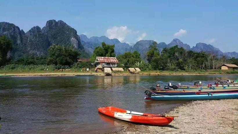 Vang Vieng: Day Tour with Kayaking, Ziplining, and Rafting - Lunch in Vang Vieng: Regional Food and a Real Reset