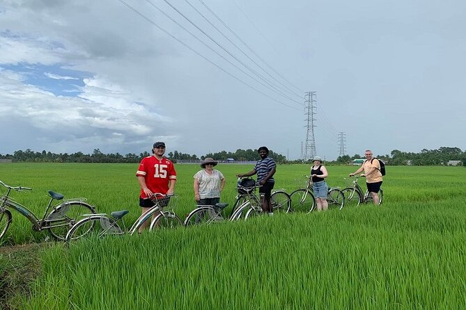 VIP Mekong Delta Adventure Cycling & Kayaking - Private Day Trip - Vinh Trang Pagoda at midday: a calm reset from motion