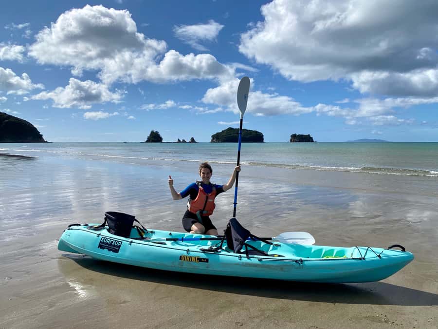 Whangamata: Donut Island Guided Kayaking Experience - Entering the lagoon: volcanic rock, turquoise water, and the swell factor